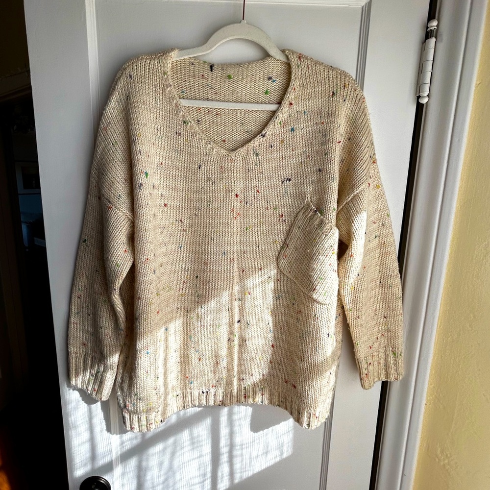 Confetti Cream V-Neck Knitted Sweater with a Front Pocket